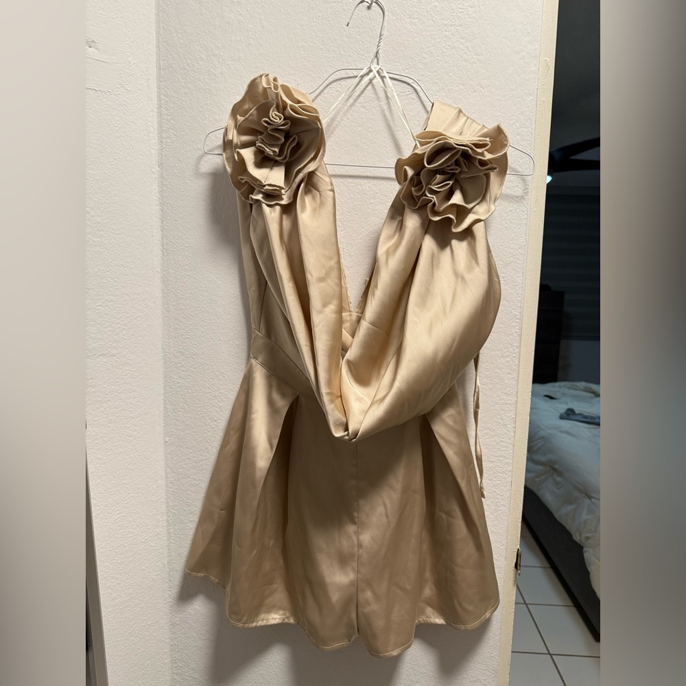 Luxxel Tan Romper with V-Neck and flower details